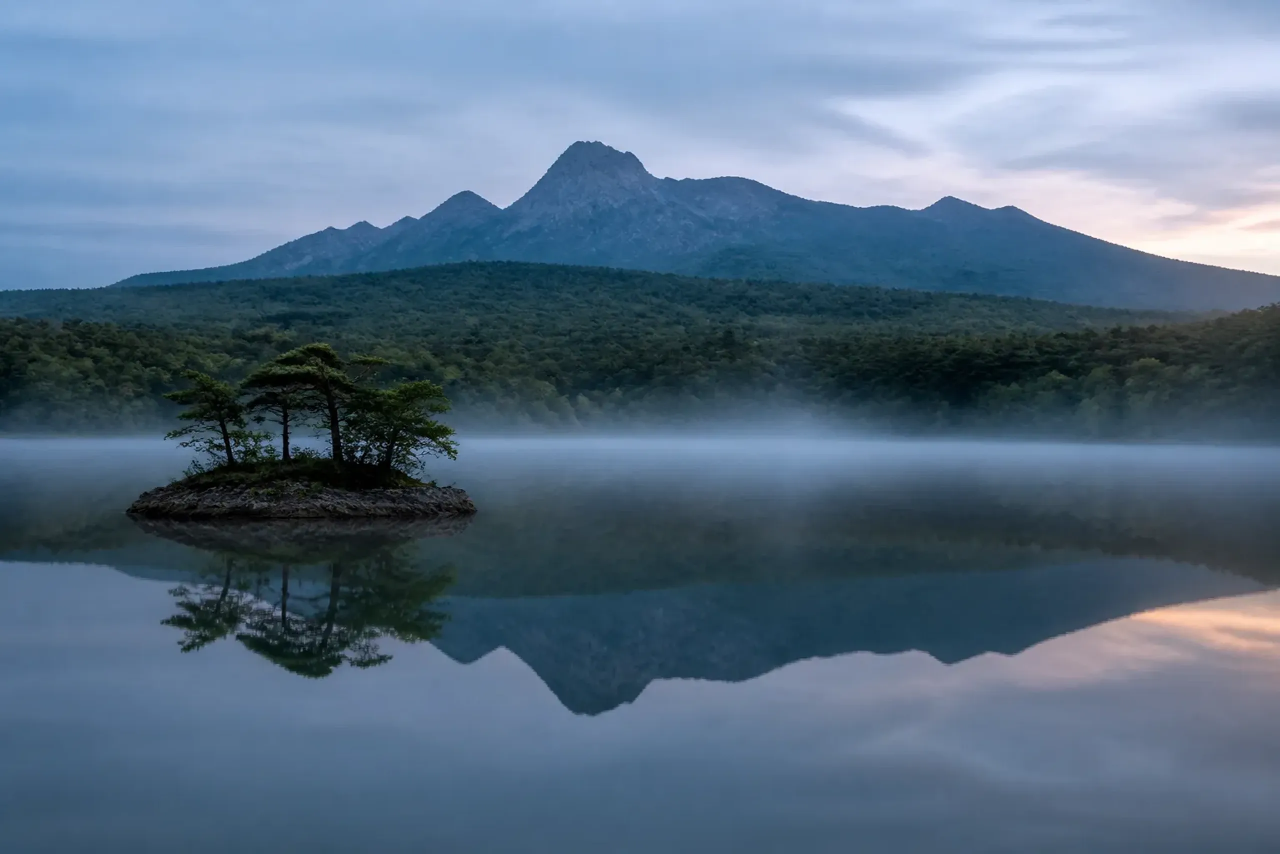 Mount Komagatake reflected on the still waters of Onuma Quasi-National Park
