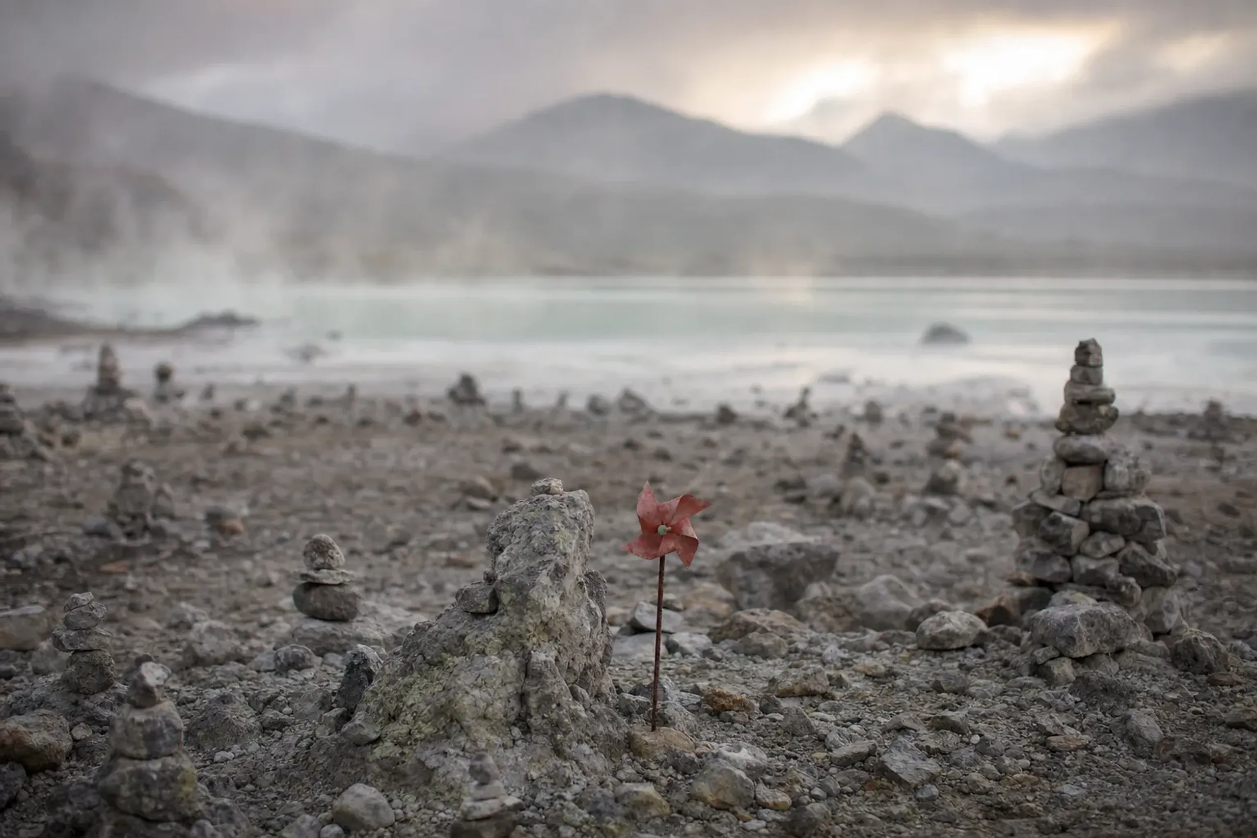 the volcanic sulphur fields and still caldera lake of Osorezan in Aomori, the place founded by Ennin where mediums are said to speak with the dead