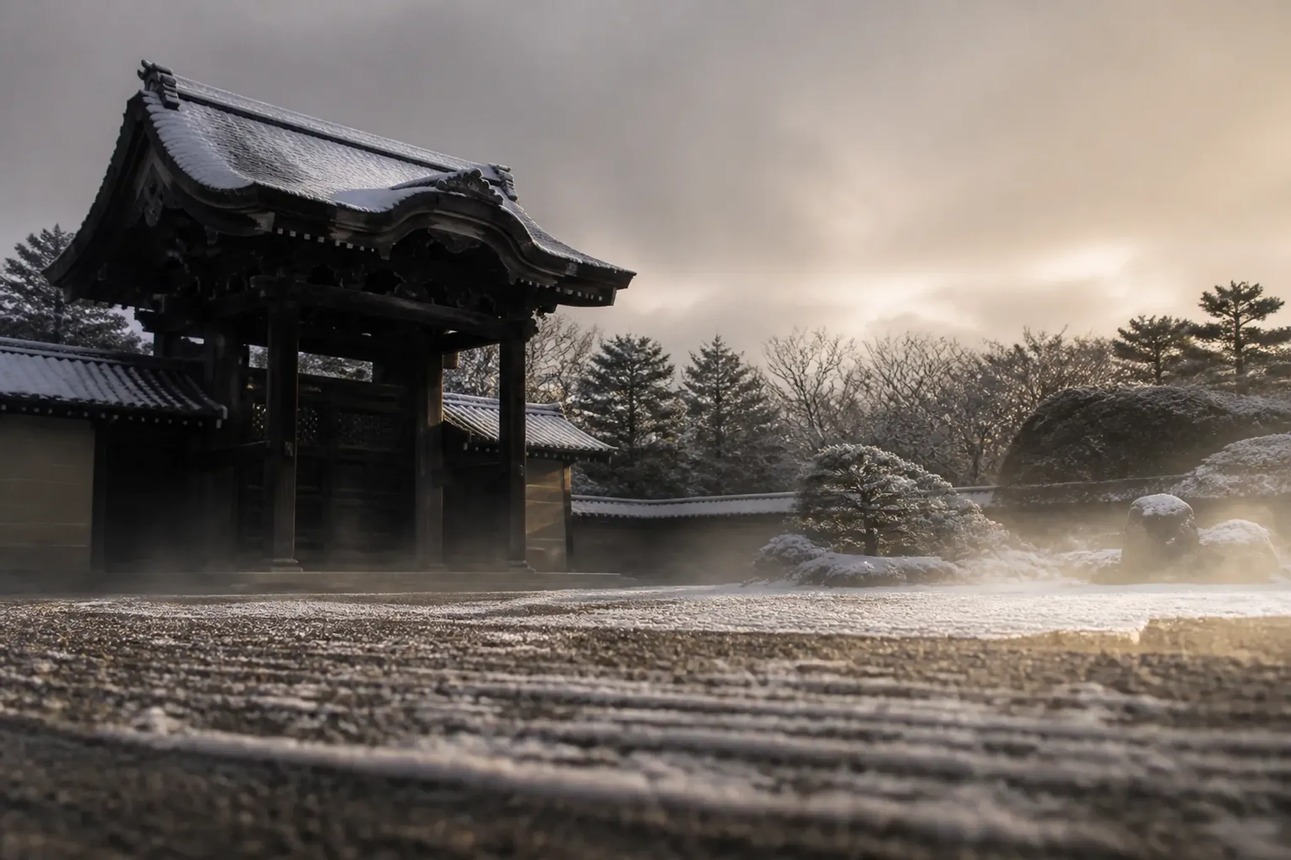 Ninna-ji temple grounds in Kyoto at sunrise with empty paths and gates