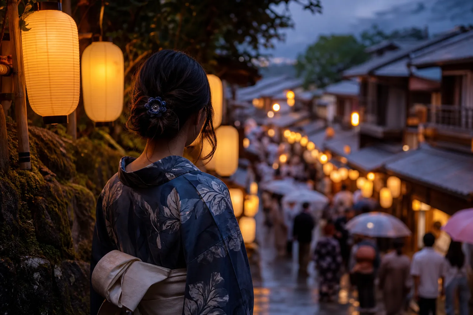 Visitor in yukata watching a Japanese festival at dusk with lanterns behind