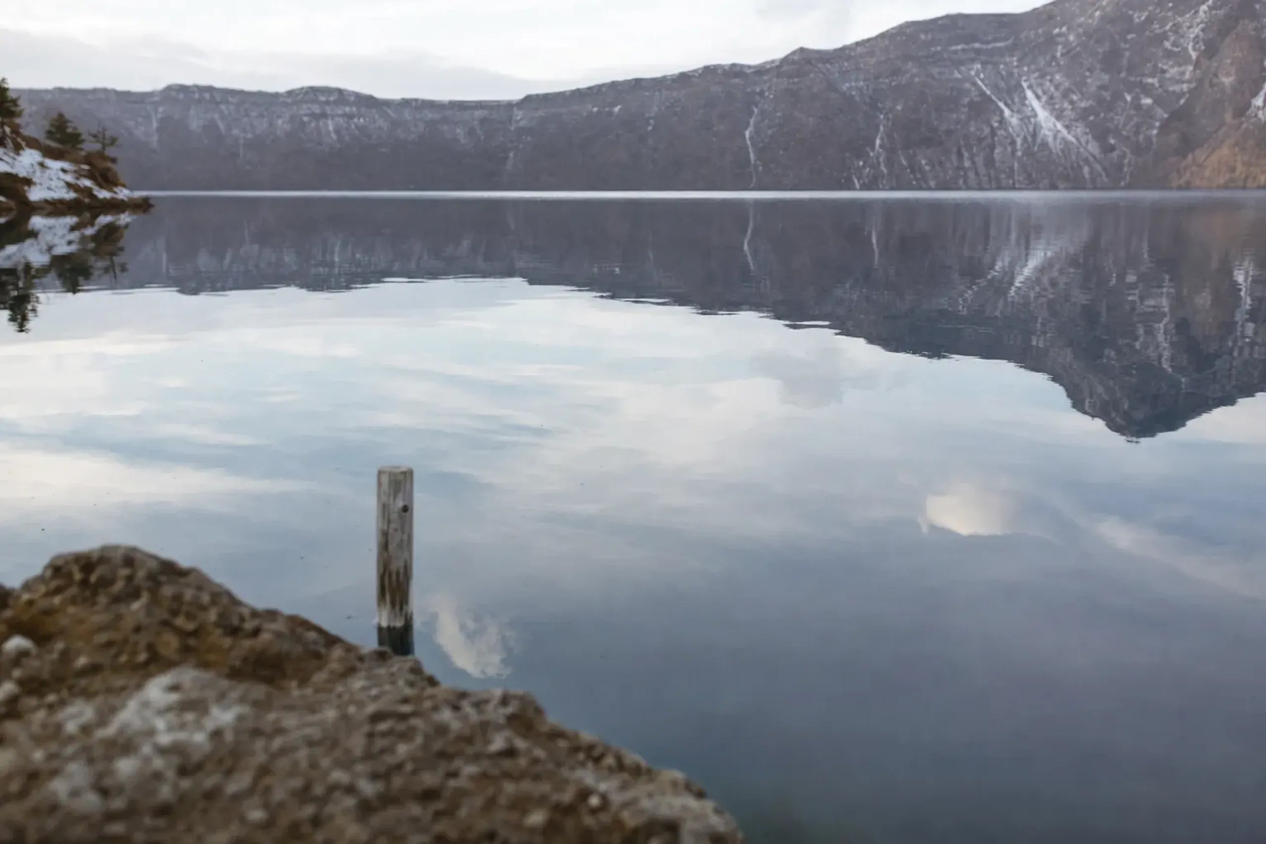 Lake Towada is a caldera lake on the Aomori–Akita border,