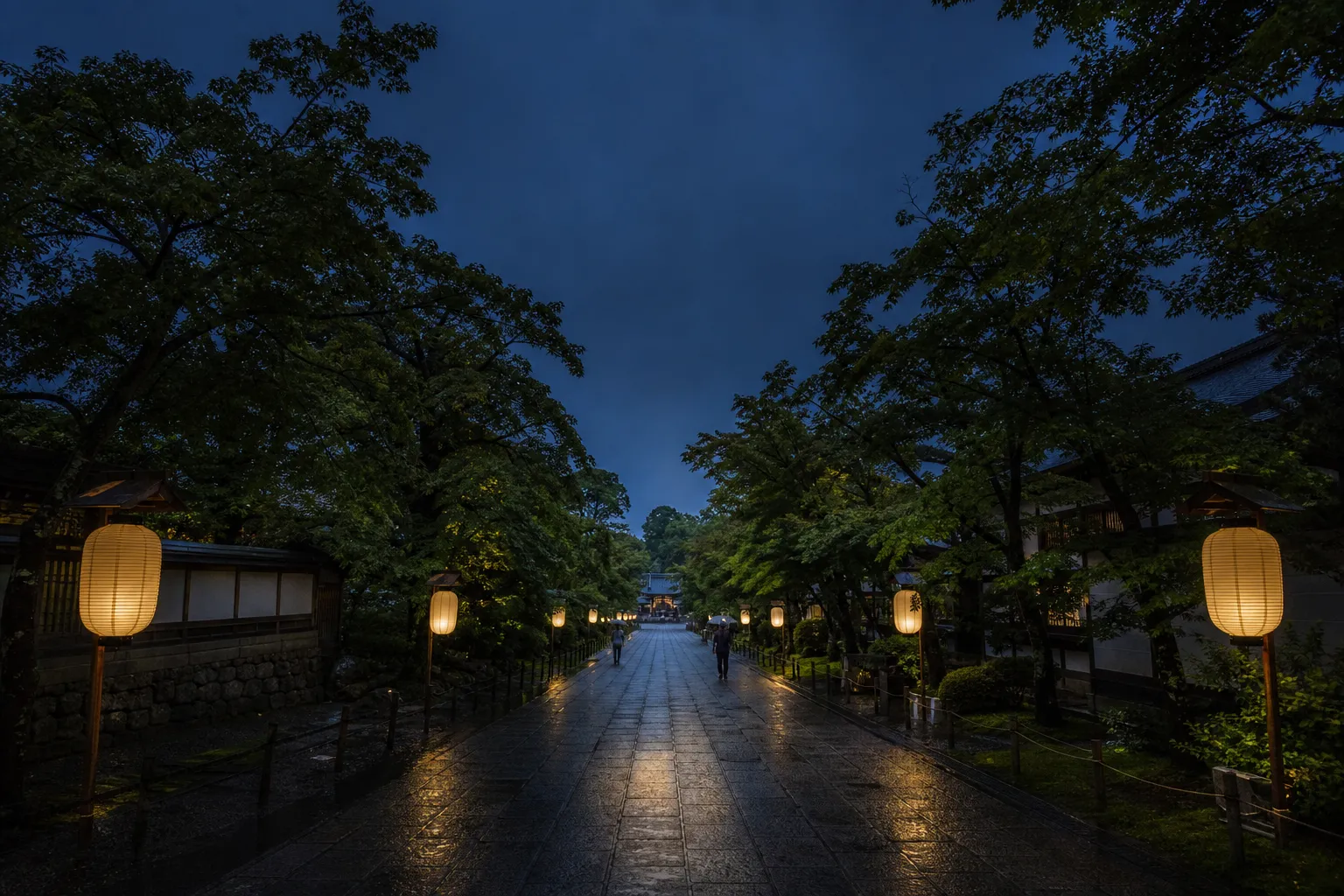 Lantern-lit temple walkway in Kyoto during an evening visit